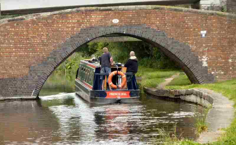 Prince Hal navigating Trent and Mersey Canal Bridge 21